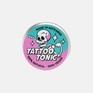 Tattoo tonic aftercare cream in a tin pottle
